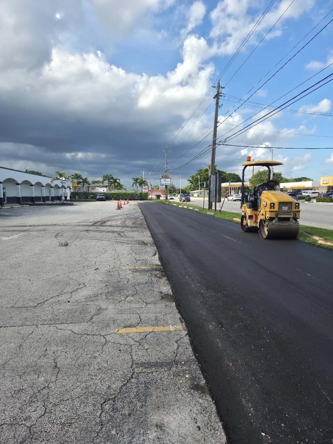 Freshly paved commercial lane after installation